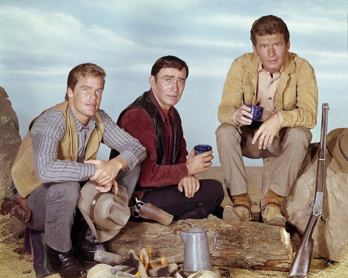 'The Virginian' cast members Doug McClure, James Drury, and Gary Clarke, dressed as cowboys