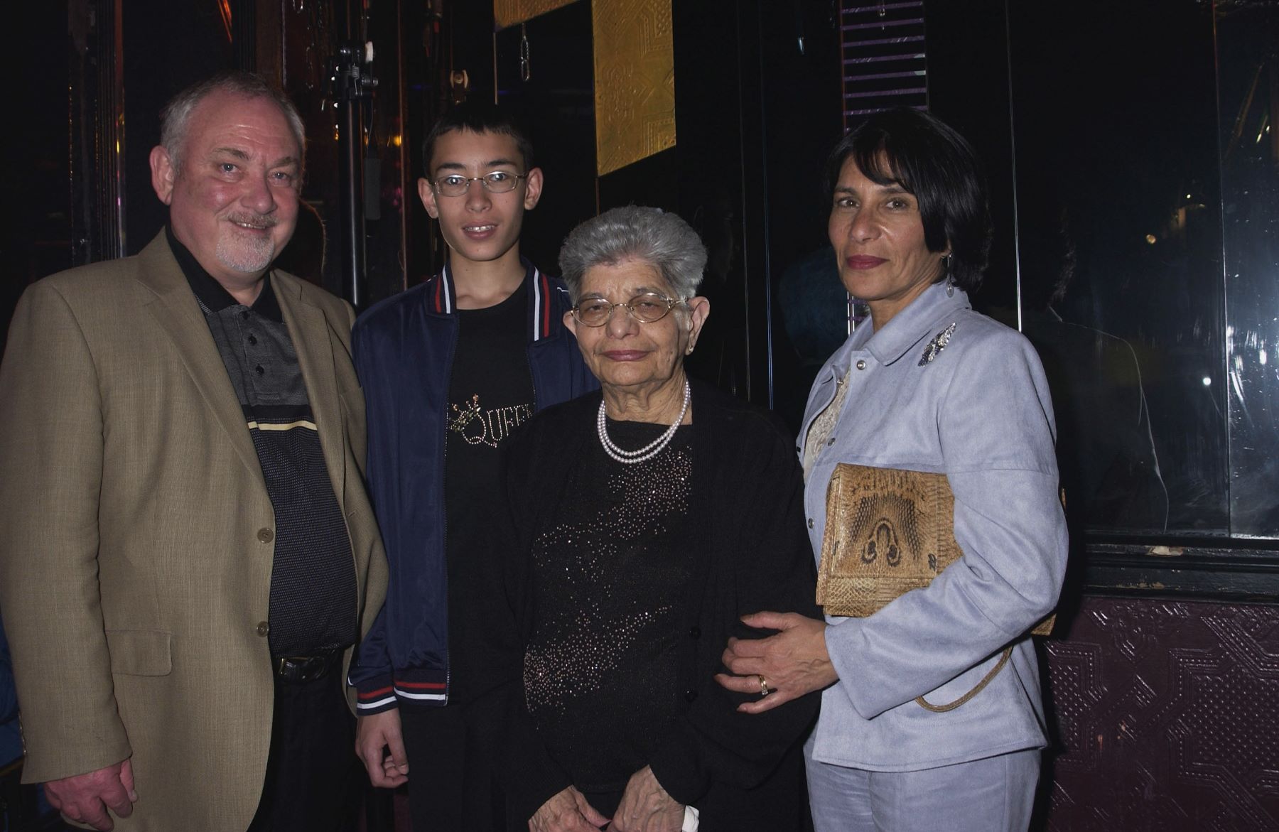 (L to R) Freddie Mercury's partner, nephew, mother, and sister at the afterparty of the 'We Will Rock You' musical