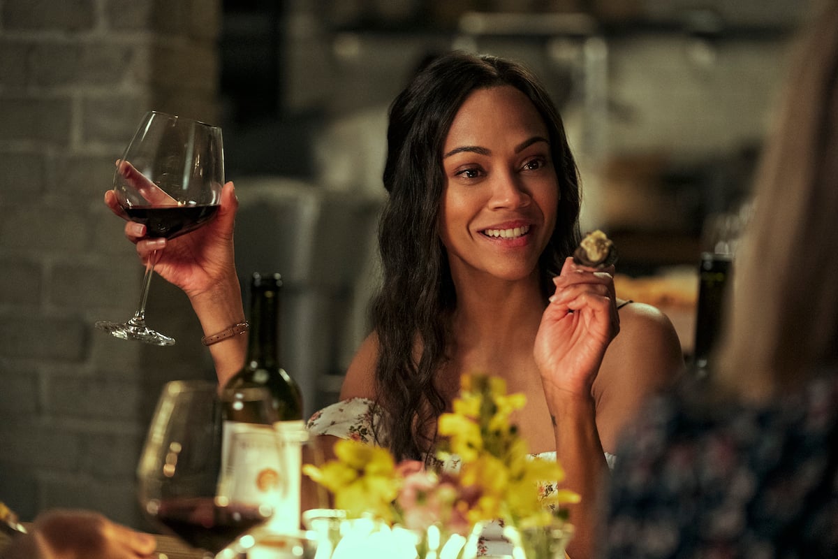 Zoe Saldana as Amy Wheeler enjoying food and wine in 'From Scratch'