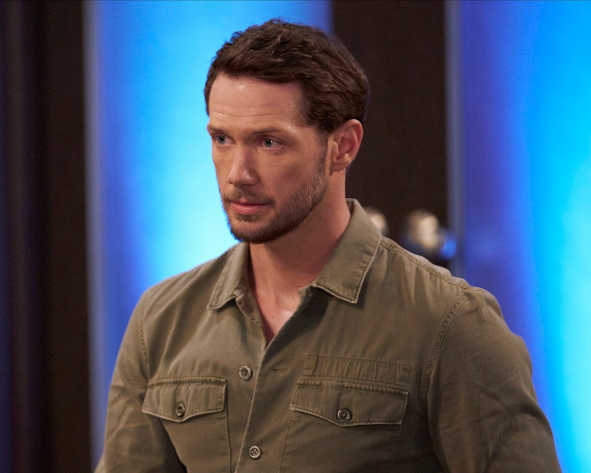 'General Hospital' actor Johnny Wactor wearing a brown shirt during a scene from the ABC soap opera.