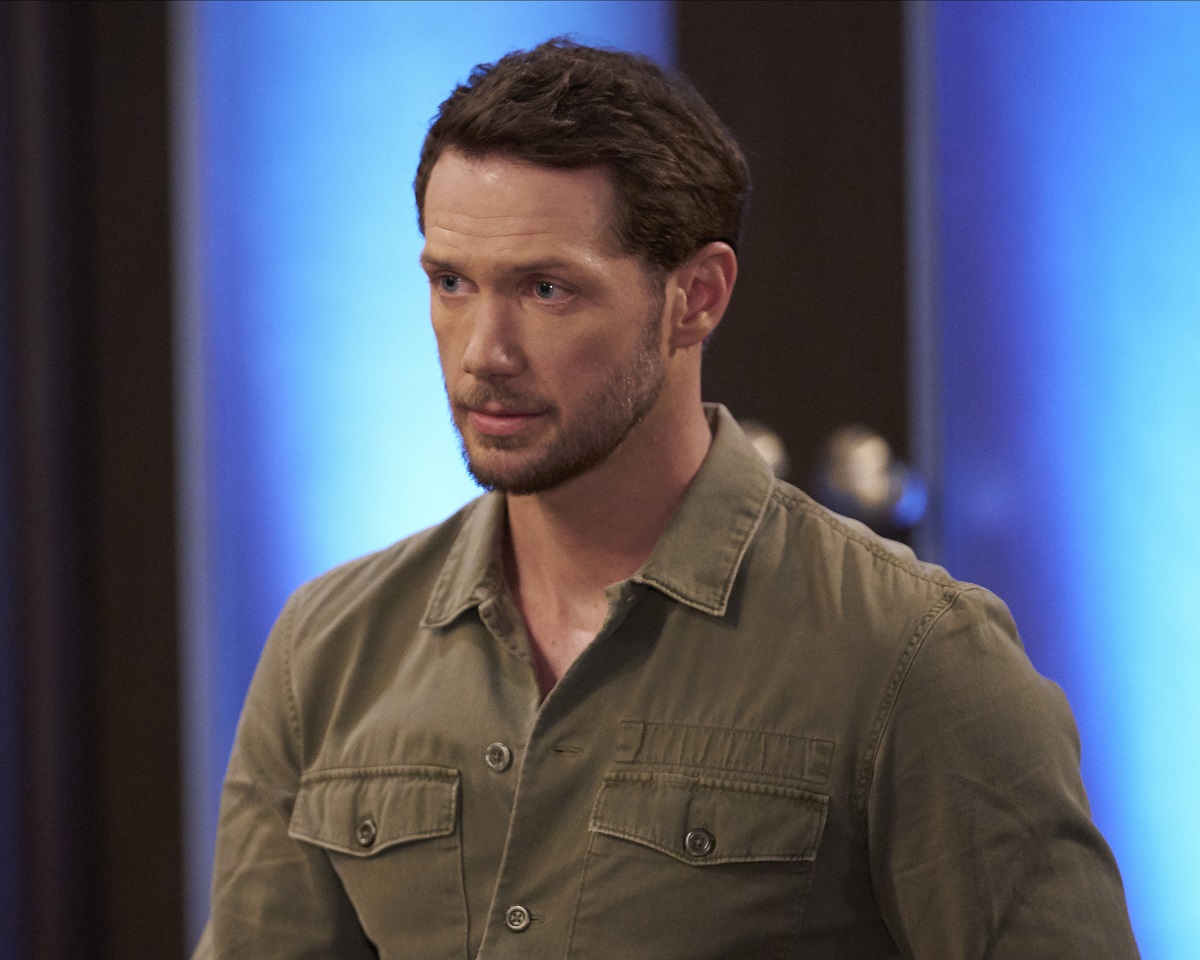 'General Hospital' actor Johnny Wactor wearing a brown shirt during a scene from the ABC soap opera.