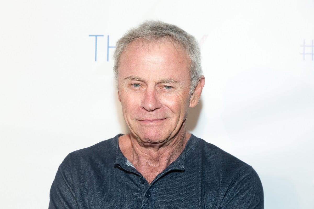 'General Hospital' star Tristan Rogers wearing a blue shirt and posing for a photo during a media appearance.