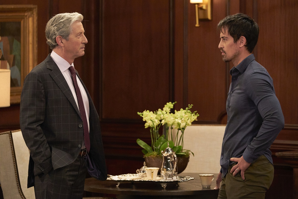 'General Hospital' stars Charles Shaughnessy in a suit and Marcus Coloma in a blue shirt perform a scene from the ABC soap opera.