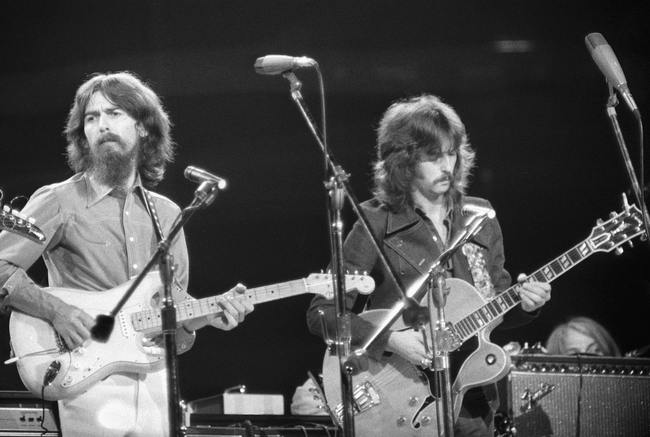 George Harrison and Eric Clapton performing at the Concert for Bangladesh in 1971.