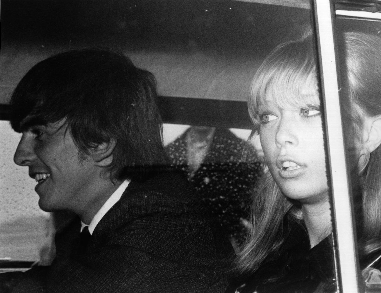 George Harrison and Pattie Boyd coming home from a vacation in 1964.