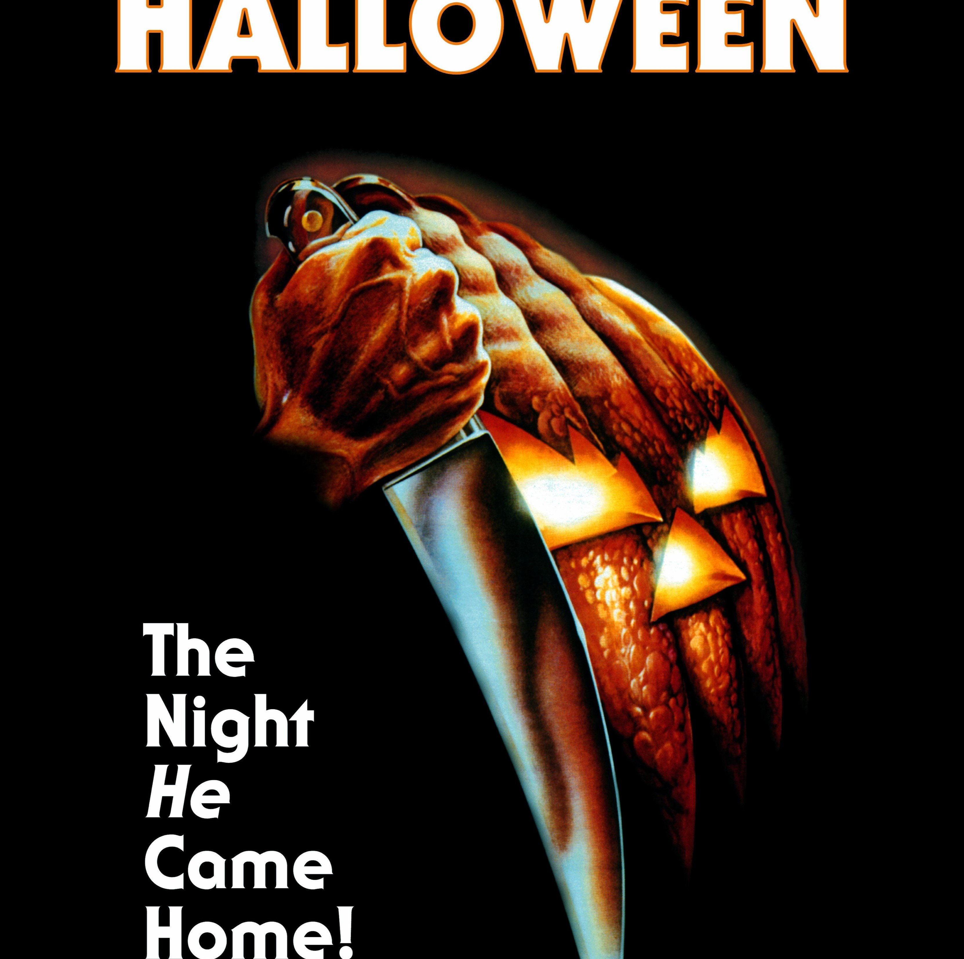 A poster for John Carpenter's 'Halloween' featuring a pumpkin