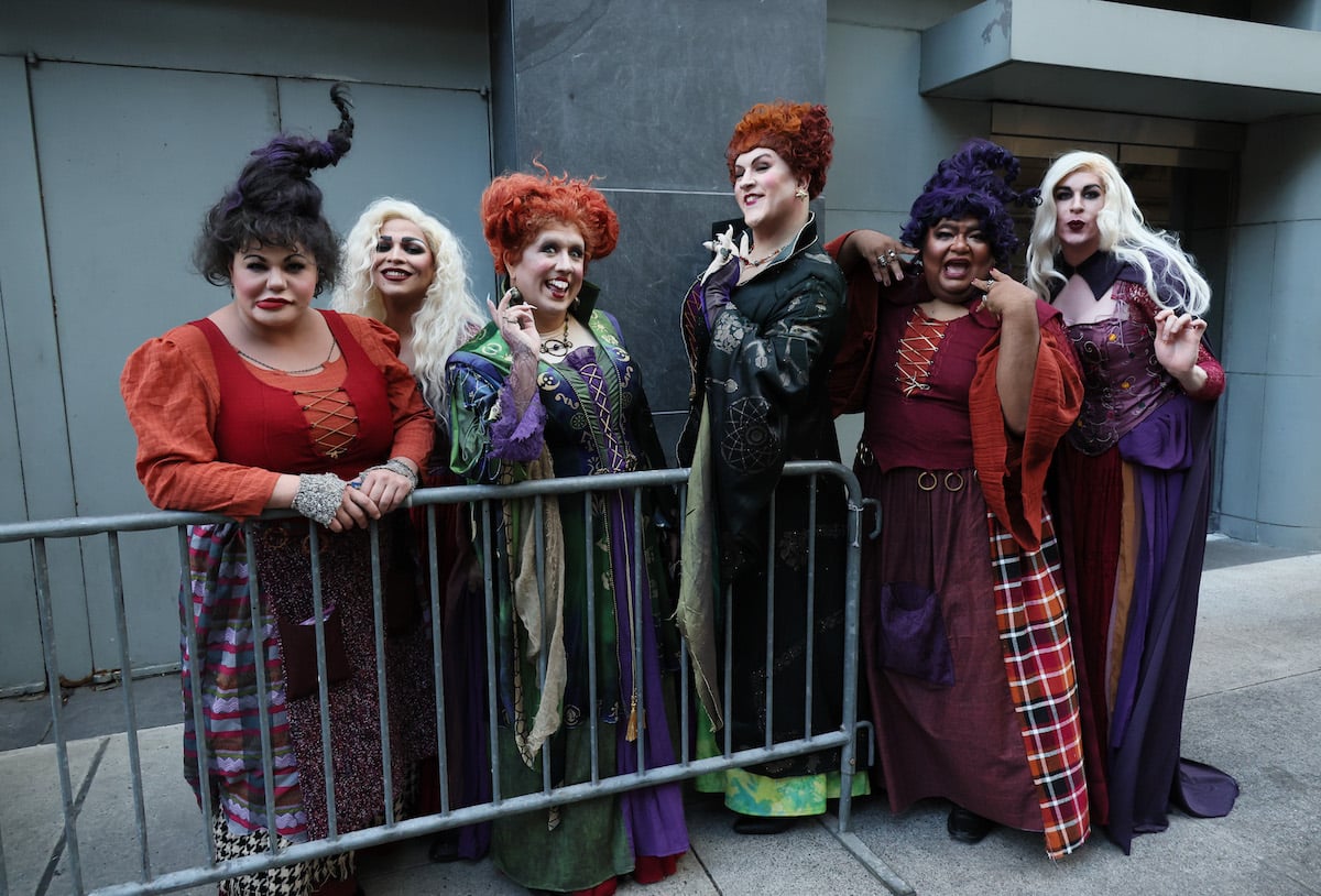 Guests in cosplay wait to enter the premiere for Disney's "Hocus Pocus 2"