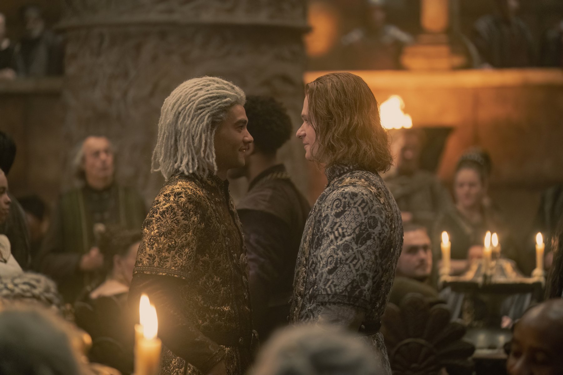 Theo Nate and Solly McLeod as Laenor and Joffrey right before the latter's death in 'House of the Dragon.' They're facing one another and smiling.