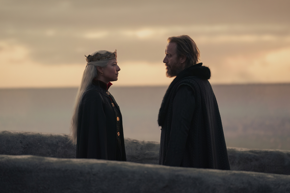 'House of the Dragon': Rhaenyra (Emma D'Arcy) and Otto (Rhys Ifans) talk on the bridge
