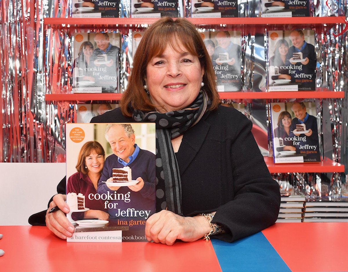 Ina Garten, whose 'Barefoot Contessa cookbook' photographer Richard Avedon once called 'the worst,' holds a copy of 'Cooking for Jeffrey' and smiles