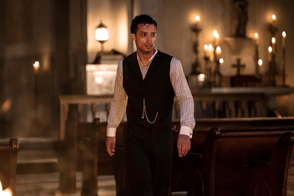 'Interview with the Vampire': Louis (Jacob Anderson) stands in a church with candles