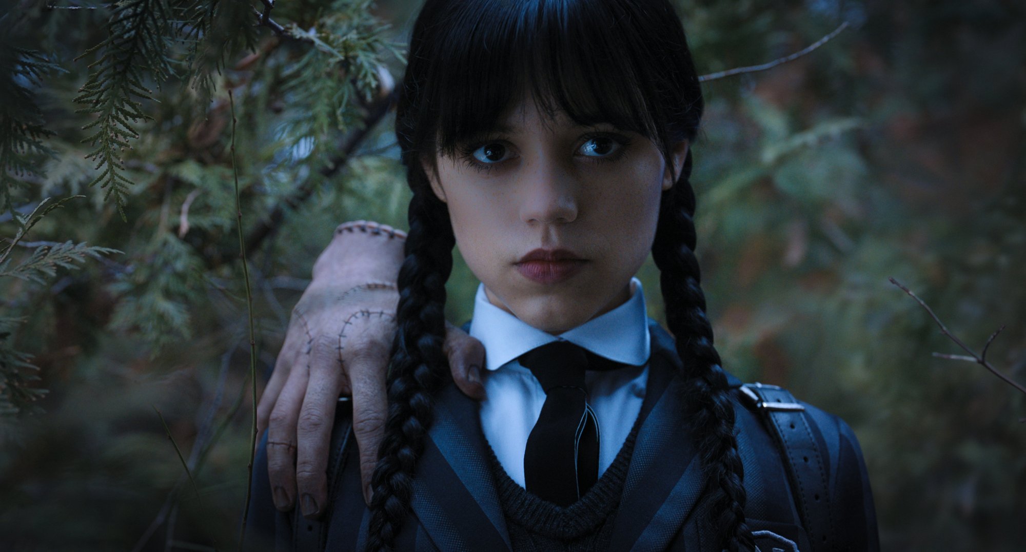 Jenna Ortega and Thing in Tim Burton's 'Wednesday.'