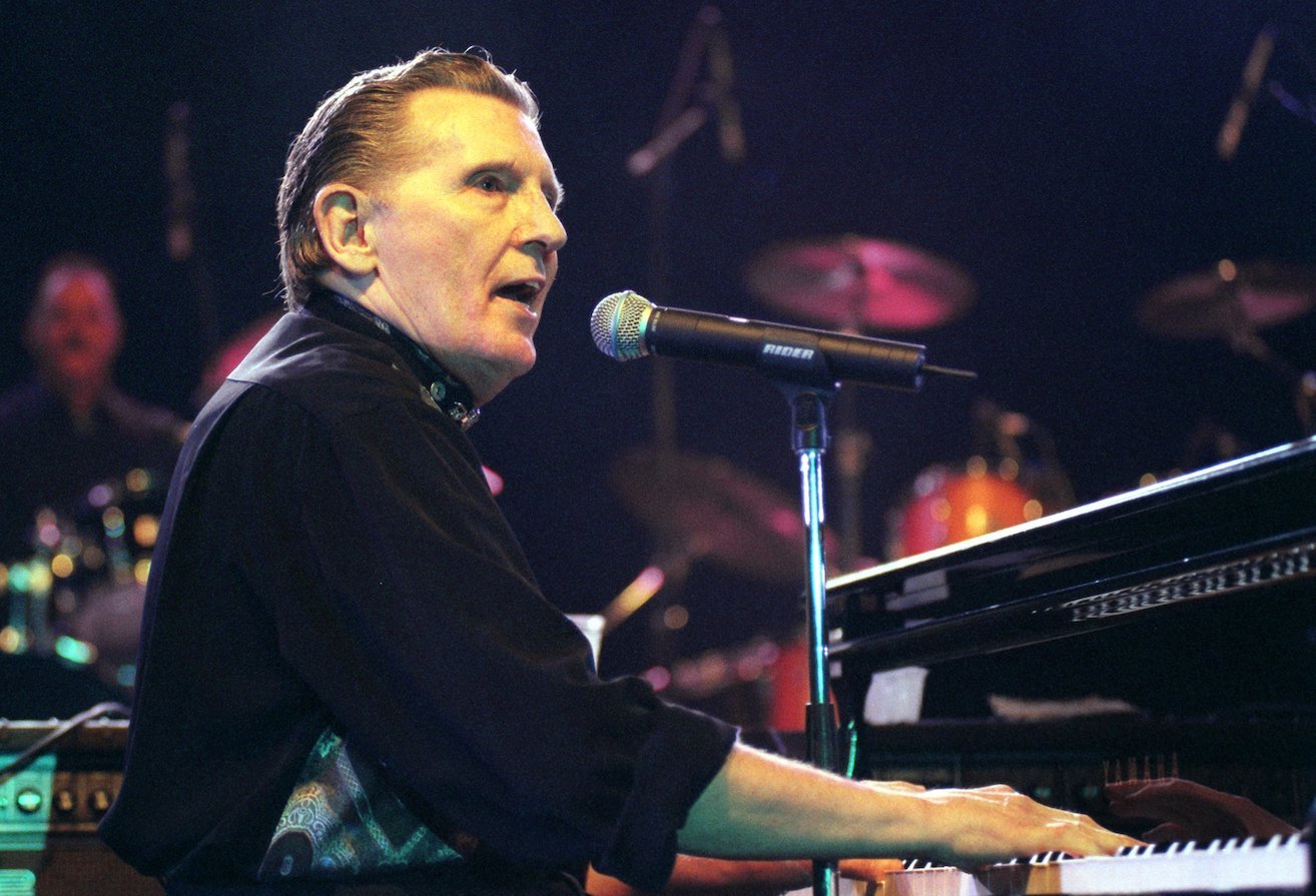 Jerry Lee Lewis playing piano and singing