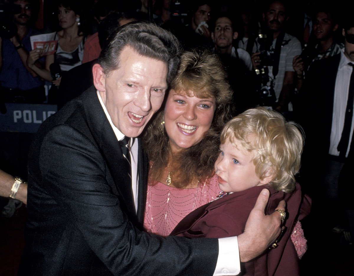 Jerry Lee Lewis with one of his wives and a child