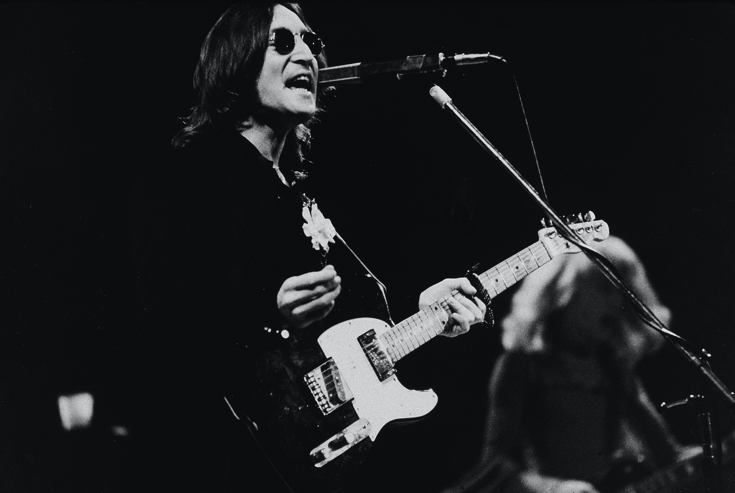 John Lennon performs onstage at Madison Square Garden