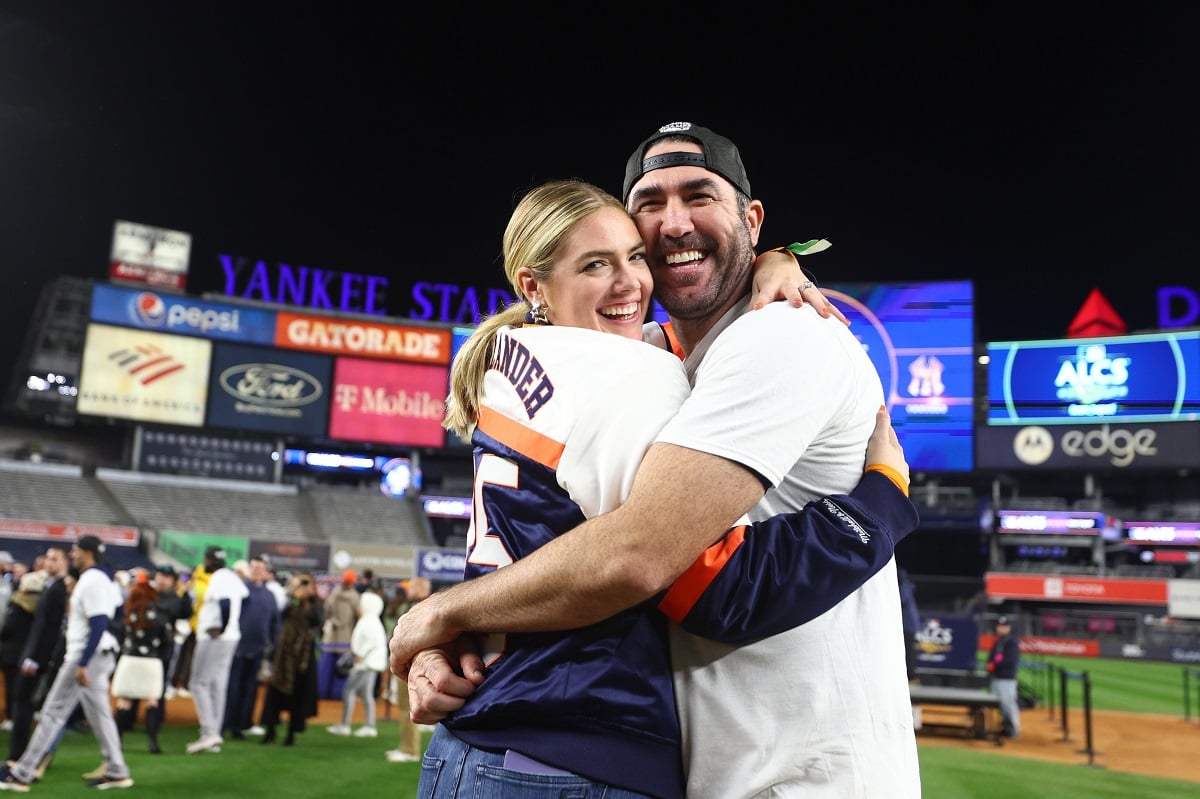 Justin Verlander, who is older than Kate Upton, celebrates with his wife after defeating the New York Yankees in the ALCS
