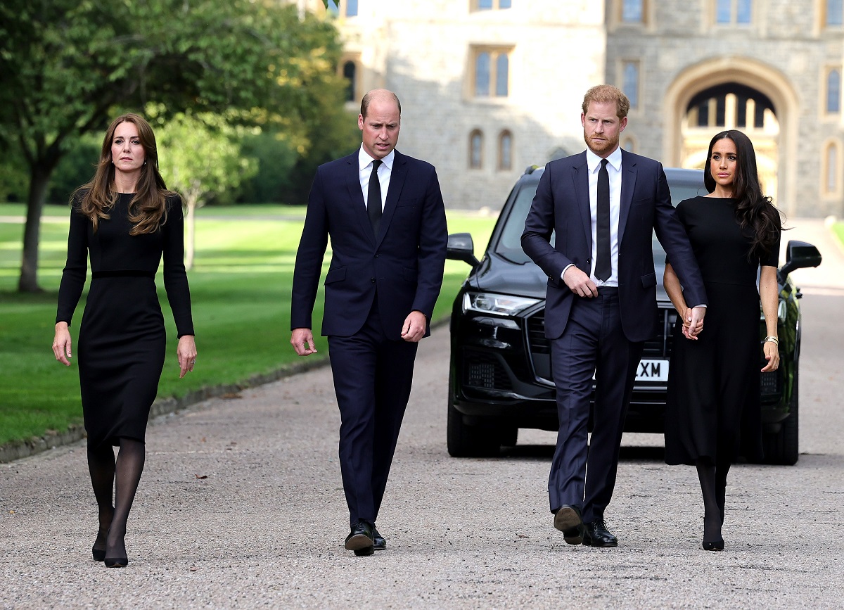 Kate Middleton, Prince William, Prince Harry, and Meghan Markle arrive at Windsor Castle to view flowers and tributes to Queen Elizabeth II