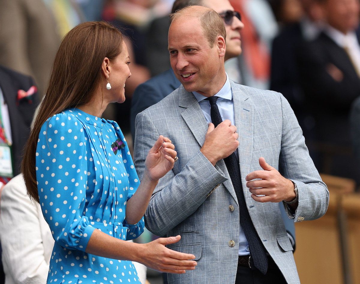Kate Middleton, who silently 'teases' Prince William with her smile according to body language expert Judi James, smiles at Prince William, who smiles back, at Wimbledon 2022