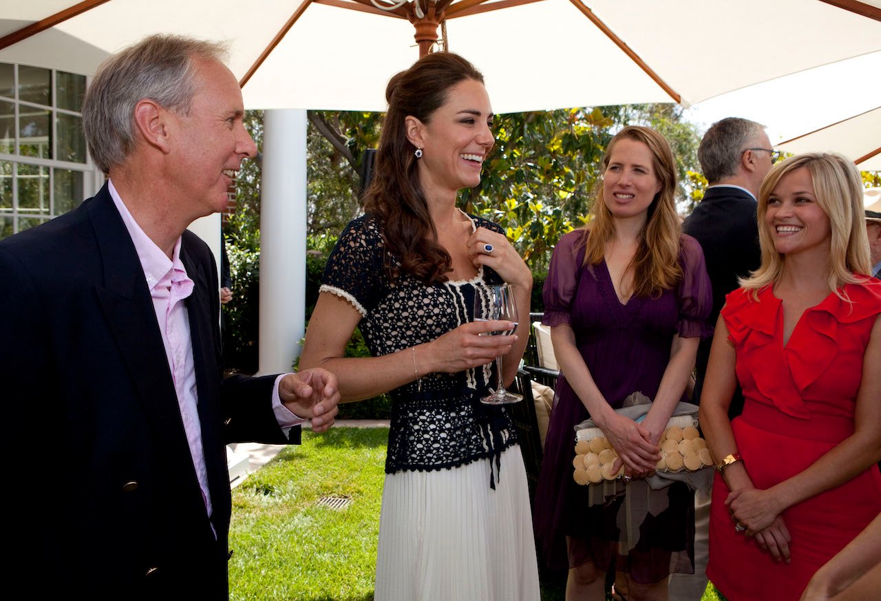 Kate Middleton speaks with the CEO of Tusk Charlie Mayhew, Kristin Gore, and Reese Witherspoon.
