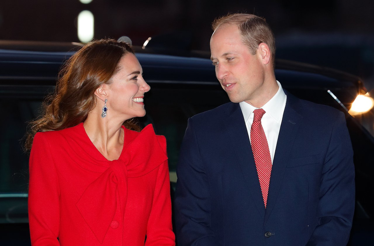 Kate Middleton and Prince William attend the 'Together at Christmas' community carol service at Westminster Abbey on December 8, 2021, in London, England. Kate hosted and spearheaded the event and wore her "superhero color."
