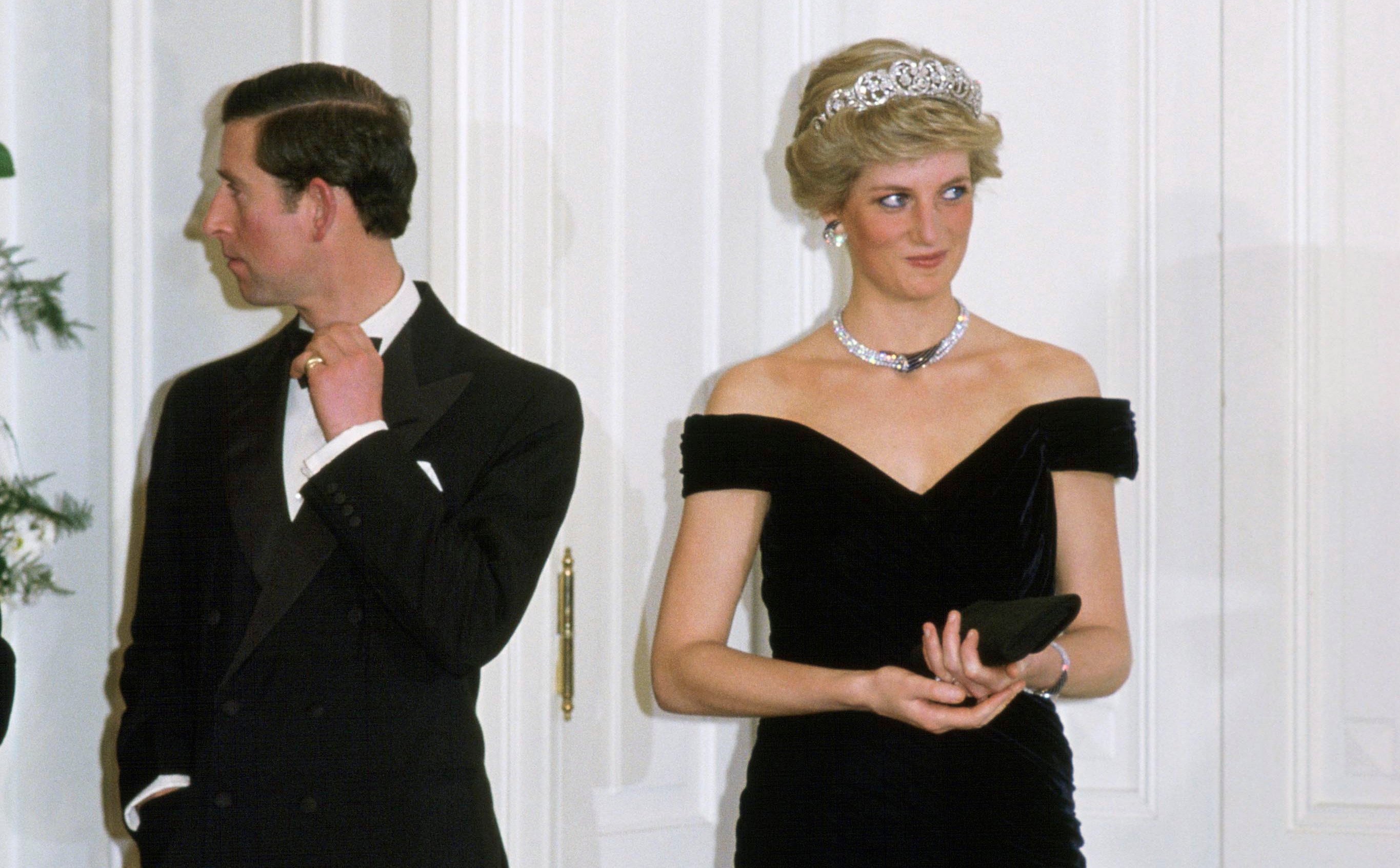 King Charles III and Princess Diana in 1987. A body language expert theorized there were early 'warning signs' of his 'lack of commitment' to her.