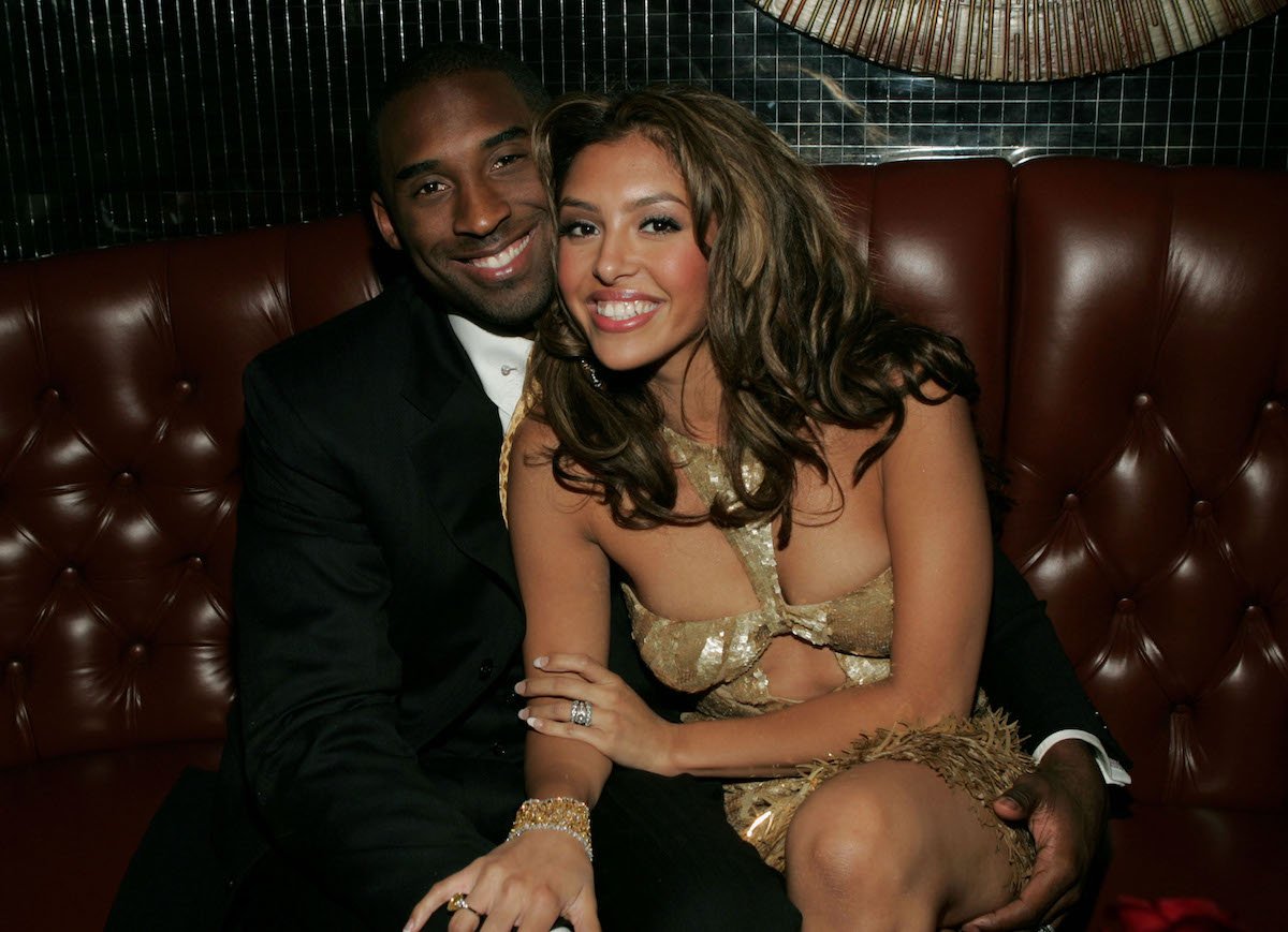 Former NBA star Kobe Bryant and wife Vanessa pose at a party in 2004