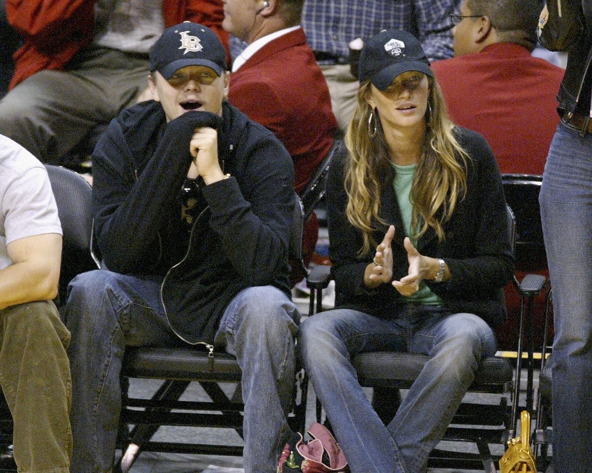 Leonardo DiCaprio and then-girlfriend Gisele Bundchen attend Game 4 of the NBA Western Conference Finals