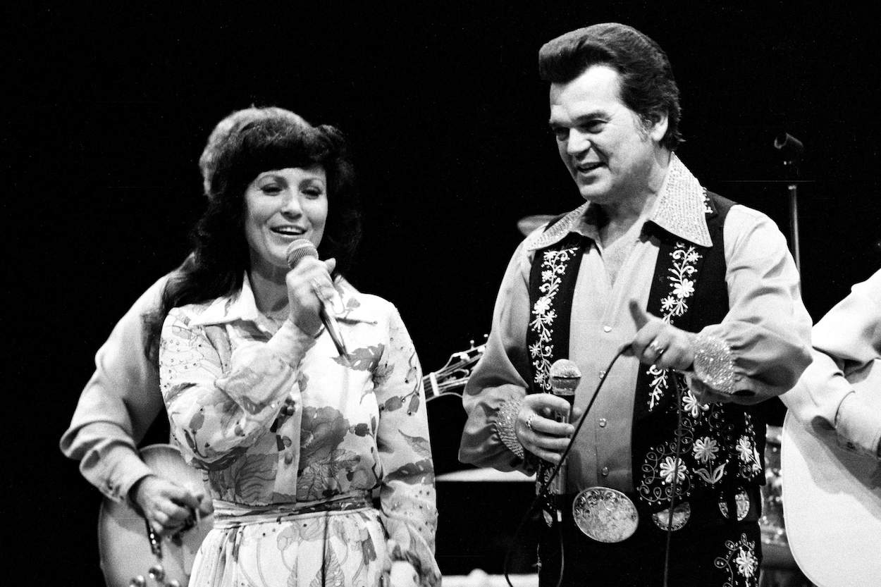 Loretta Lynn (left) once said Conway Twitty laughed when she broke her first Grammy, but stopped laughing when fate intervened.