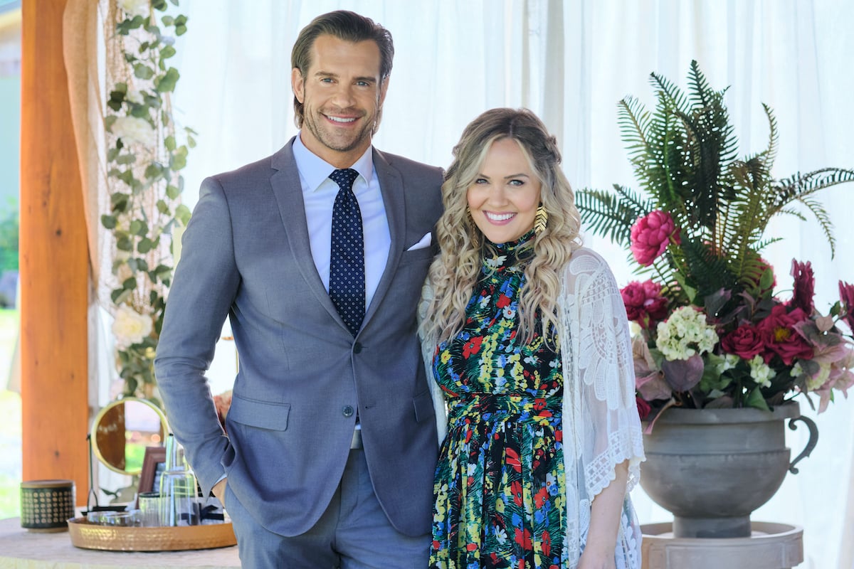 Luke, in a suit, with his arm around Bree in the 'Chesapeake Shores' series finale on Hallmark Channel