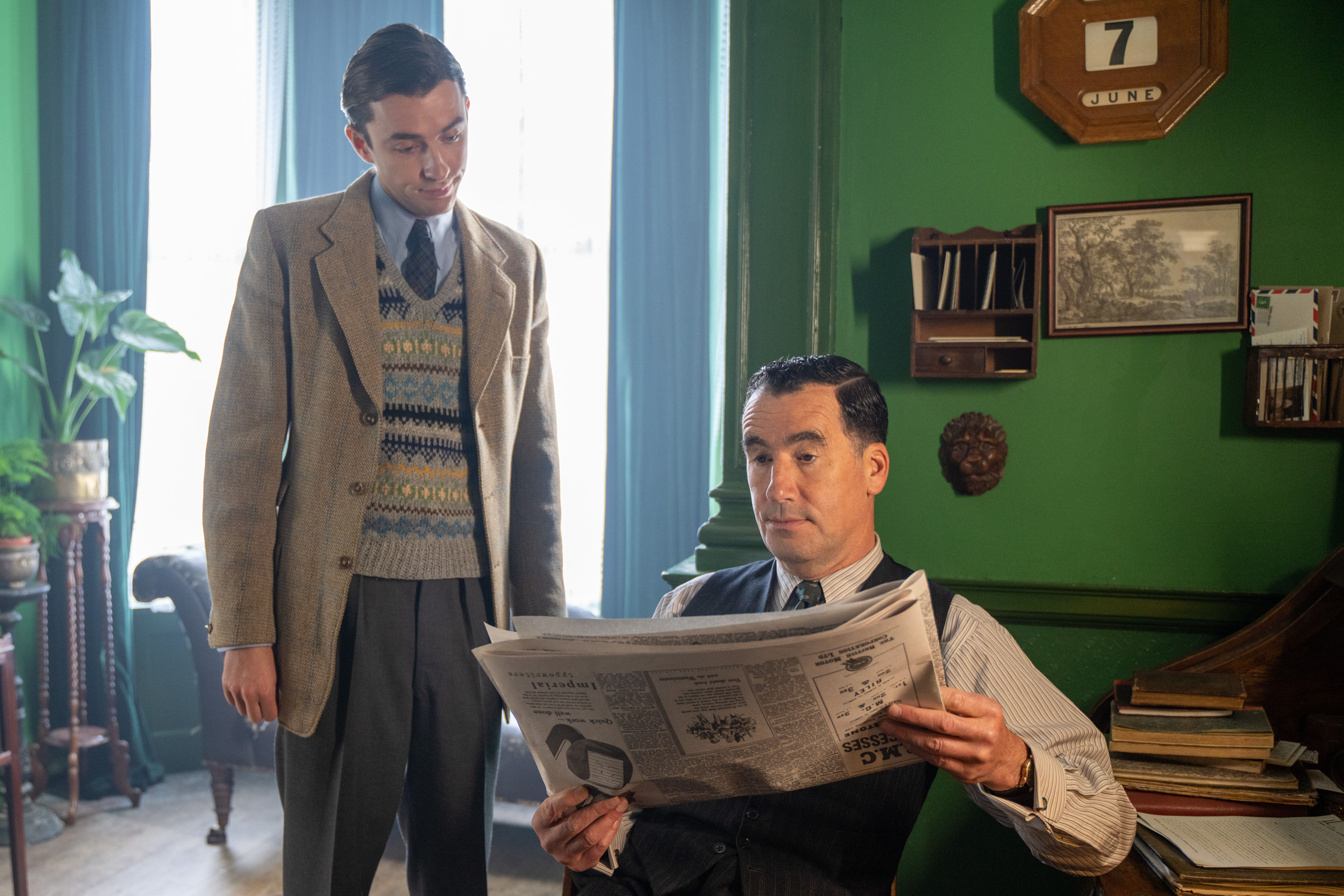 Atticus Pund showing a newspaper to Fraser in 'Magpie Murders' on PBS
