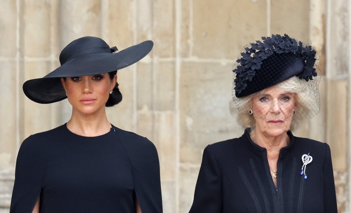 Meghan Markle and Camilla Parker Bowles standing outside Westminster Abbey following the funeral of Queen Elizabeth II