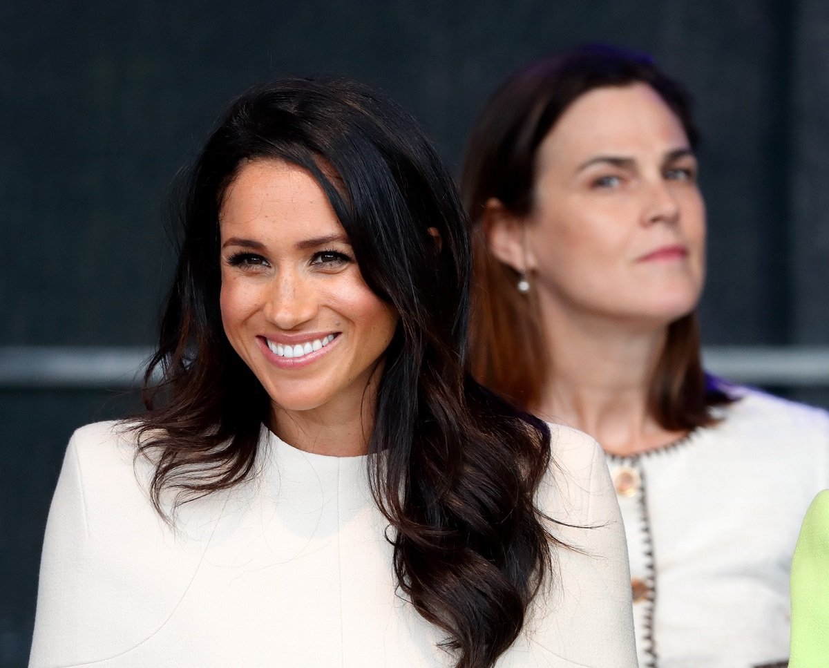 Meghan Markle and Samantha Cohen, then-private secretary to the Sussexes and former assistant private secretary Queen Elizabeth II, at ceremony in Widnes, England