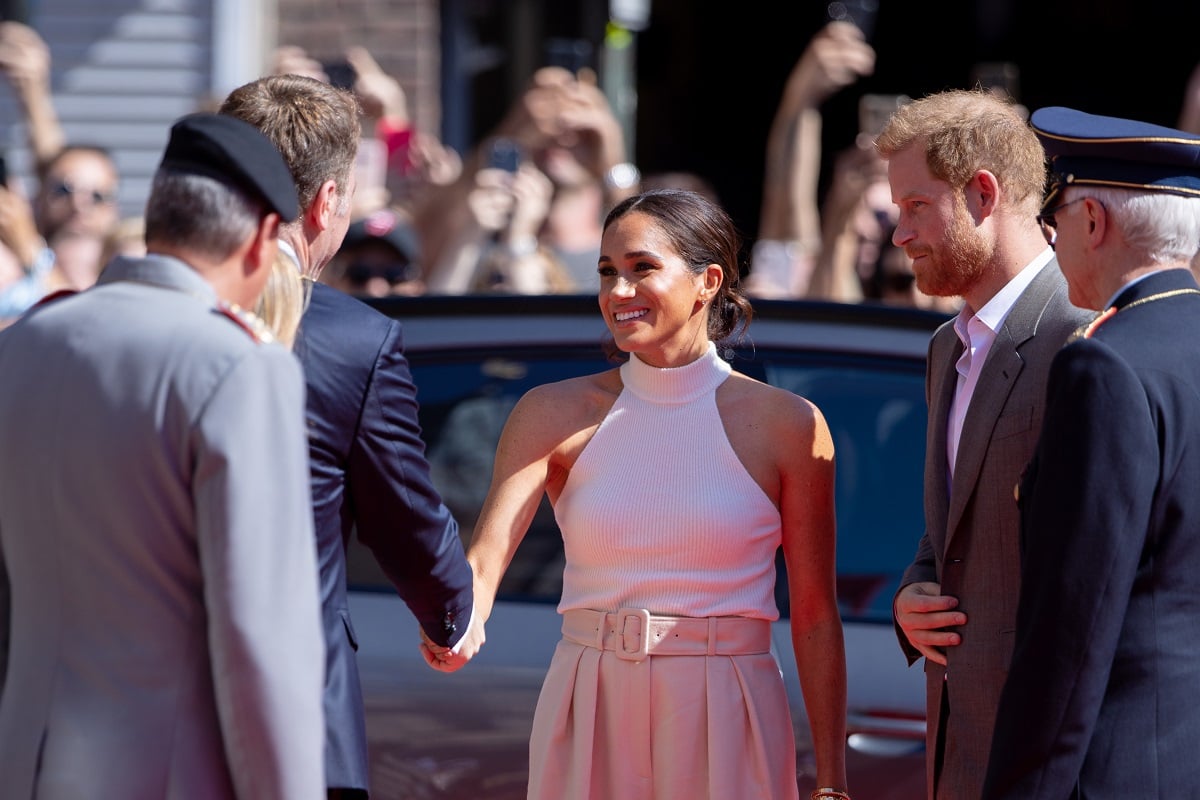 Meghan Markle shakes hands with officials in Germany during the Invictus Games Dusseldorf 2023 - One Year To Go event