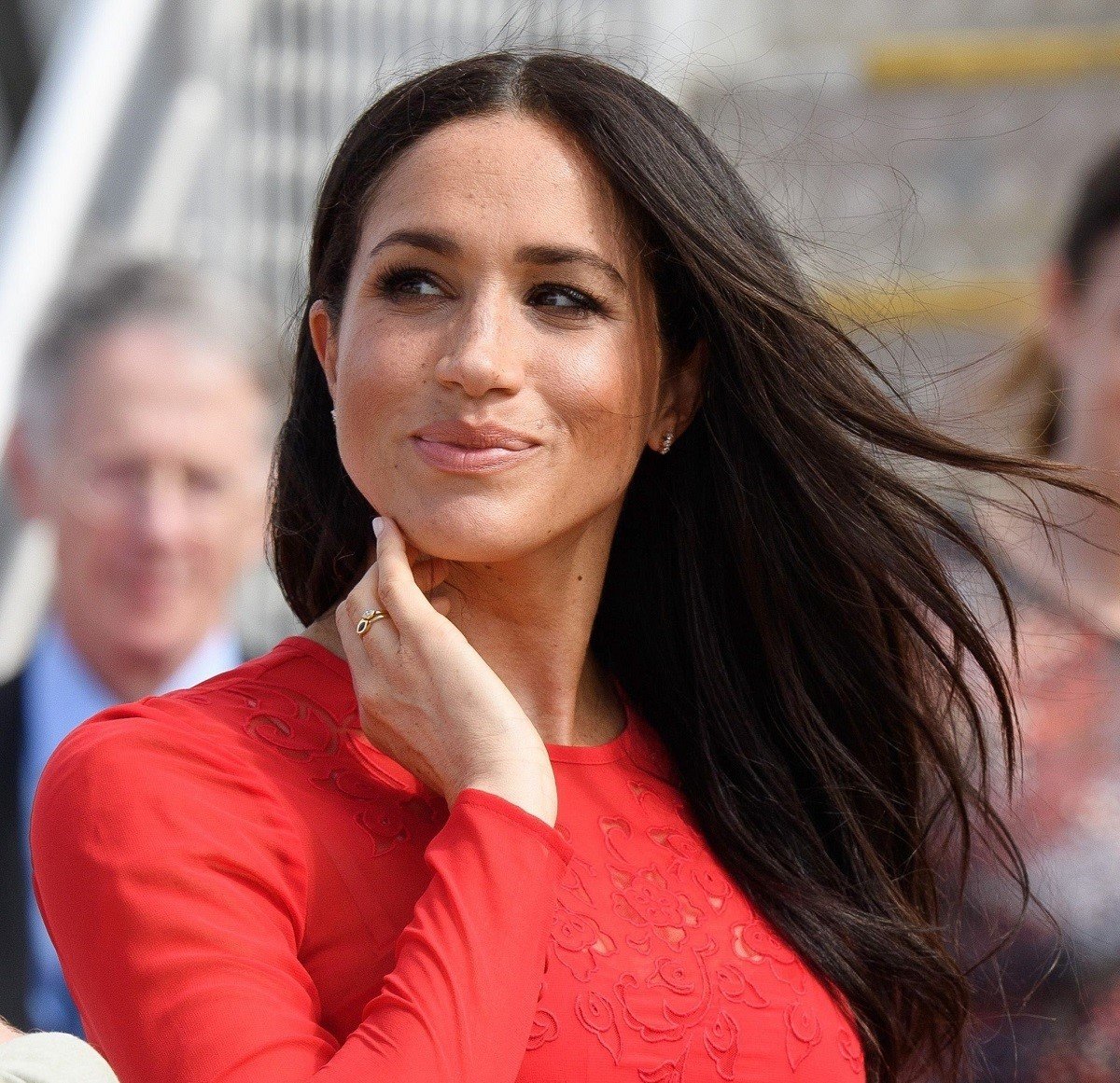 Meghan Markle smiling slightly as she arrives at Nuku'alofa airport