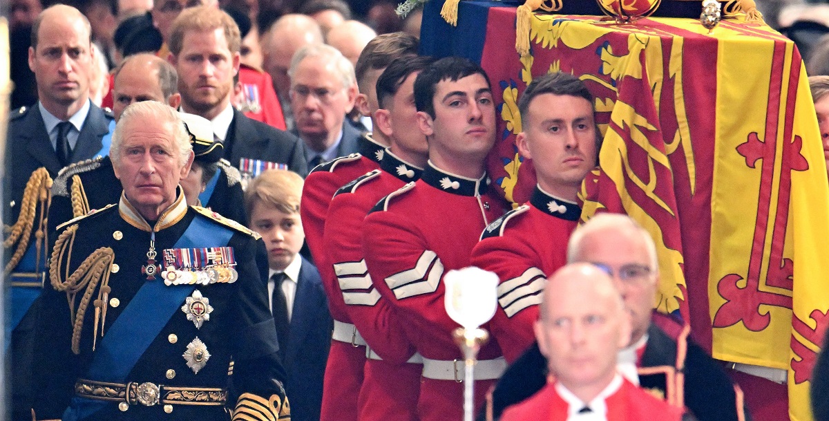 Members of the royal family follow Queen Elizabeth's coffin as it's carried through Westminster Abbey