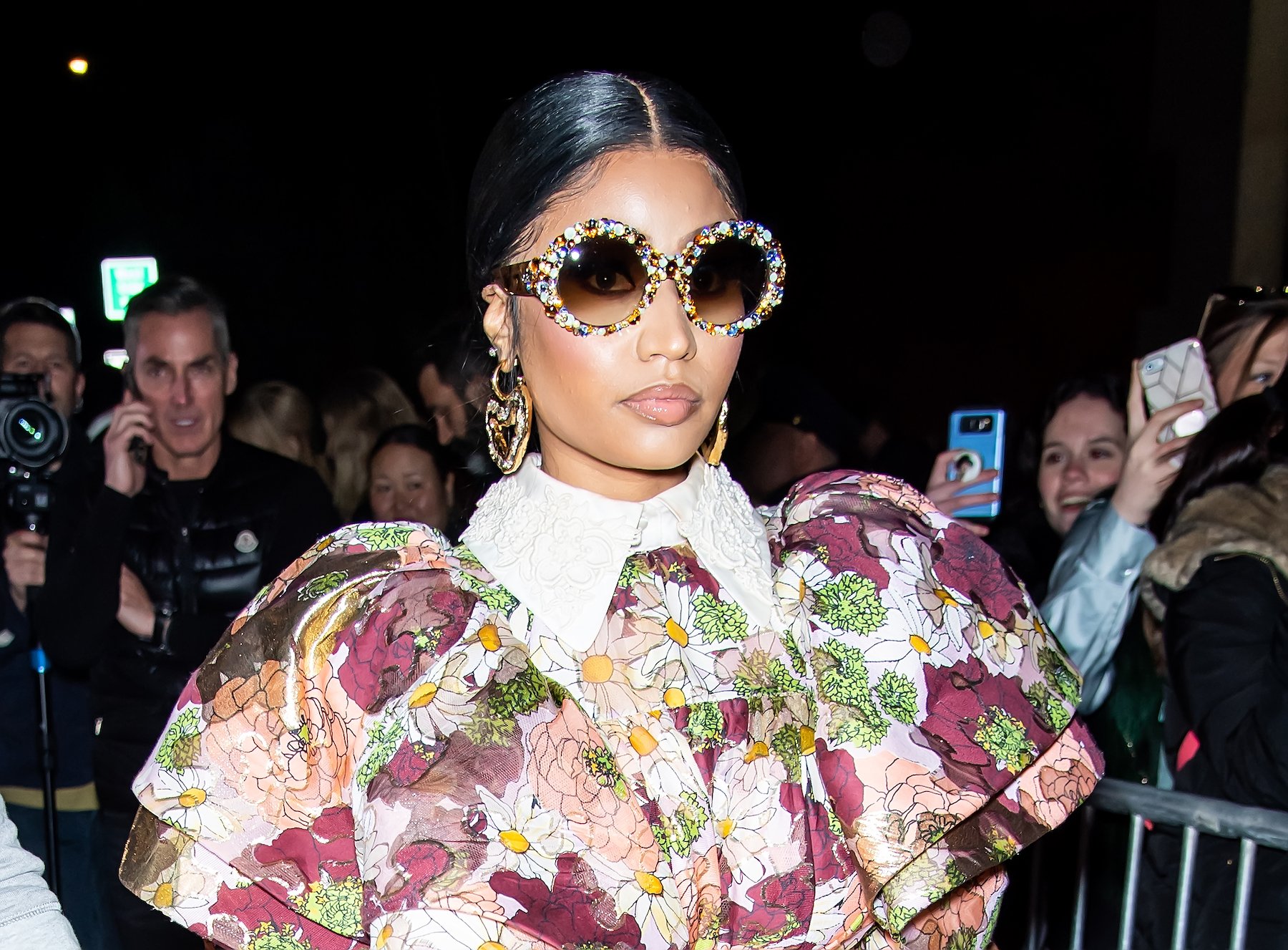 Nicki Minaj, who was snubbed from the Grammys rap category in 2022, wearing a floral top