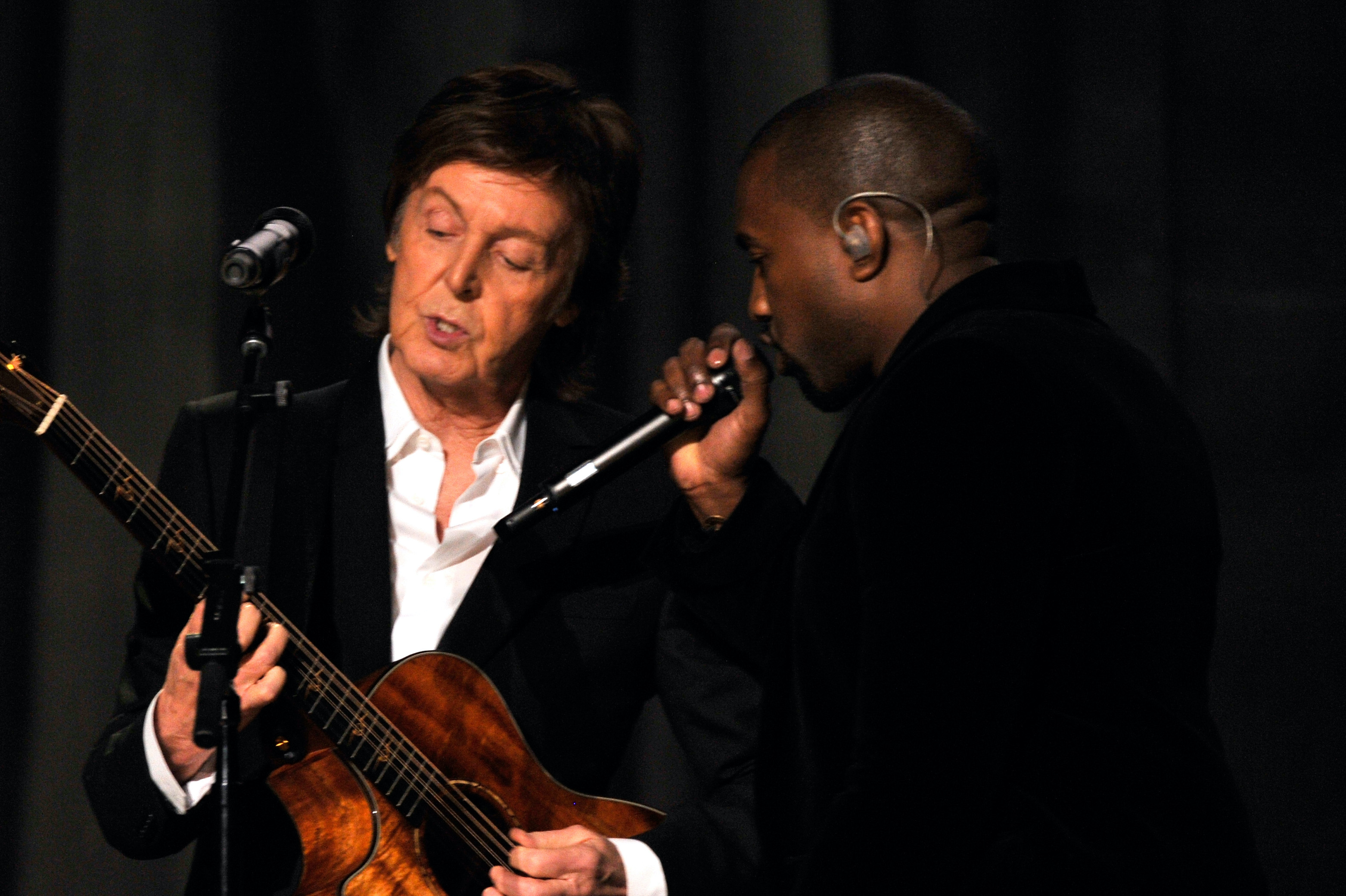 Paul McCartney and Kanye West perform onstage at the 57th Annual Grammy Awards