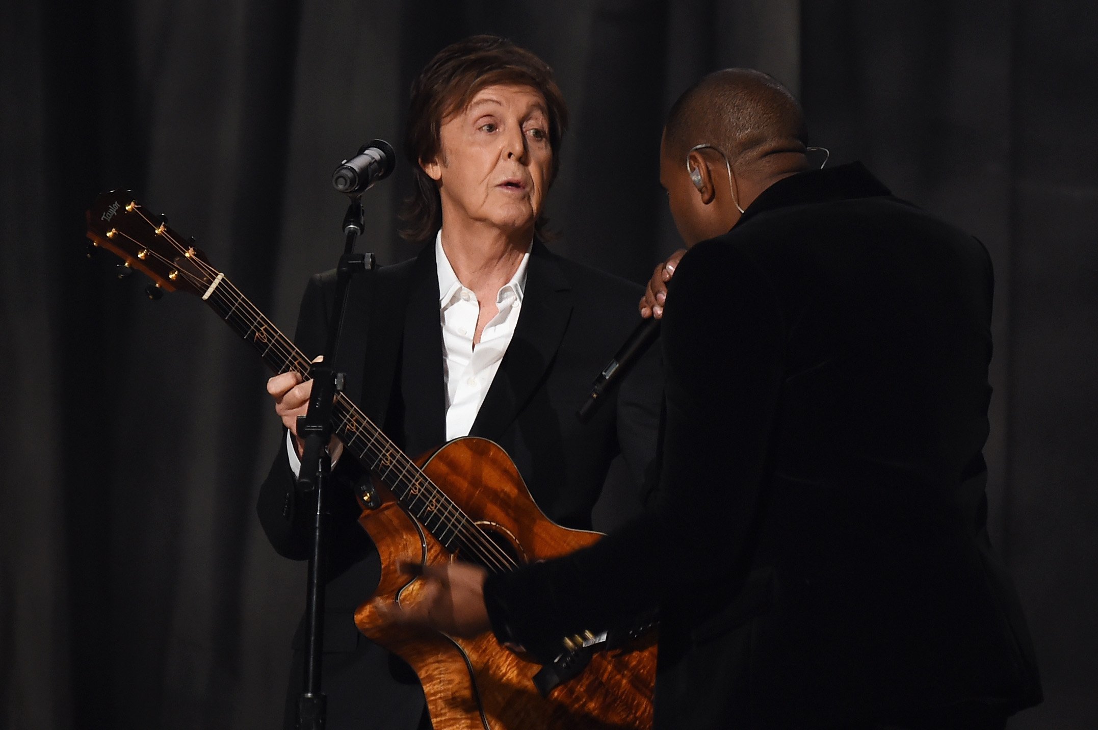 Paul McCartney and Kanye West perform onstage at the 57th Annual Grammy Awards