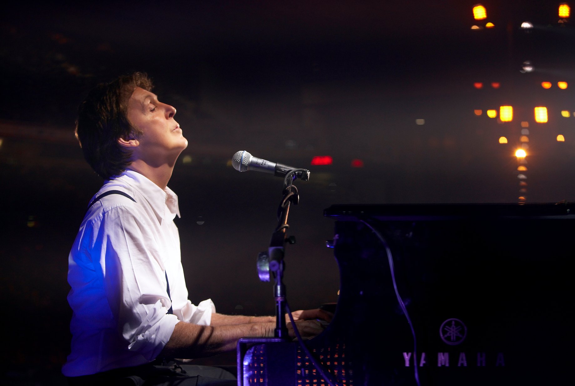 Paul McCartney plays the piano at the Liverpool Sound concert in 2008