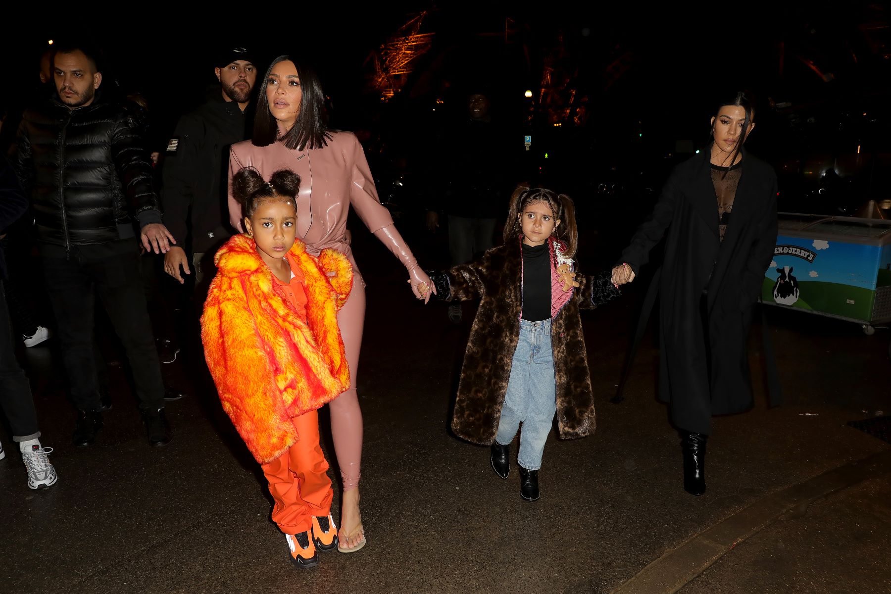 (L to R) North West, Kim Kardashian, Penelope Disick, and Kourtney Kardashian near the Eiffel Tower in Paris
