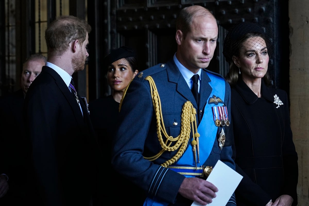 Prince Harry, Meghan Markle, Prince William, and Kate Middleton leave after escorting the coffin of Queen Elizabeth II to Westminster Hall