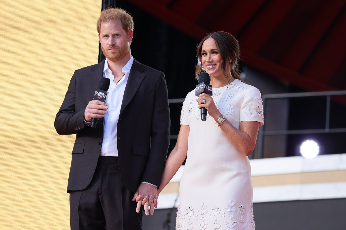 Prince Harry and Meghan Markle speak onstage during Global Citizen Live