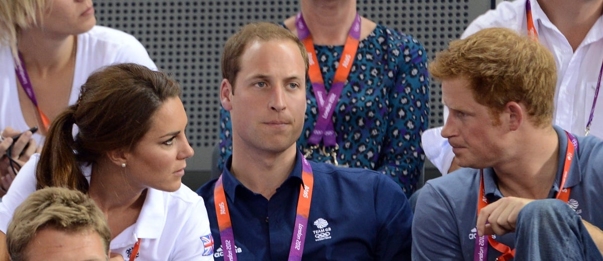 Prince William, Kate Middleton, and Prince Harry, who was upset his brother and sister-in-law didn't "roll out the red carpet" for Meghan Markle, speak together as they attend the Men's team sprint track cycling event in London