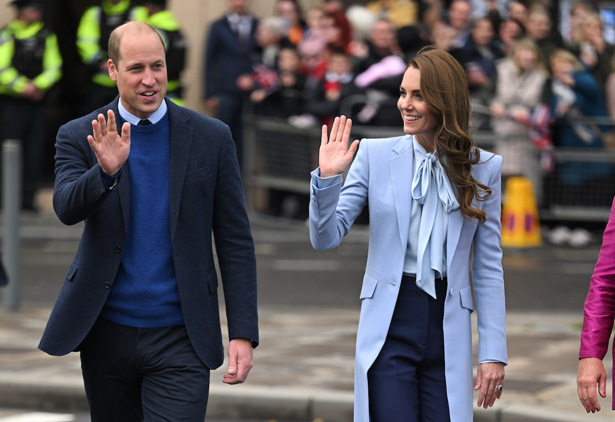 Prince William and Kate Middleton, whose coordinating blue outfits in Northern Ireland on Oct. 6, 2022, were, added according to a royal expert, 'extra charm' to their 'charm offensive' wave to crowds