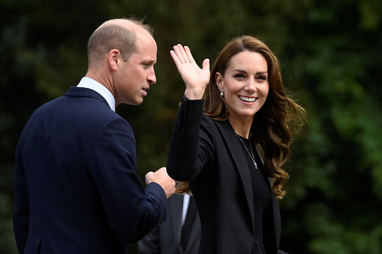Kate Middleton and Prince William, pictured greeting well-wishers after Queen Elizabeth's death, look 'dutiful' in new royal portrait, according to a royal expert.