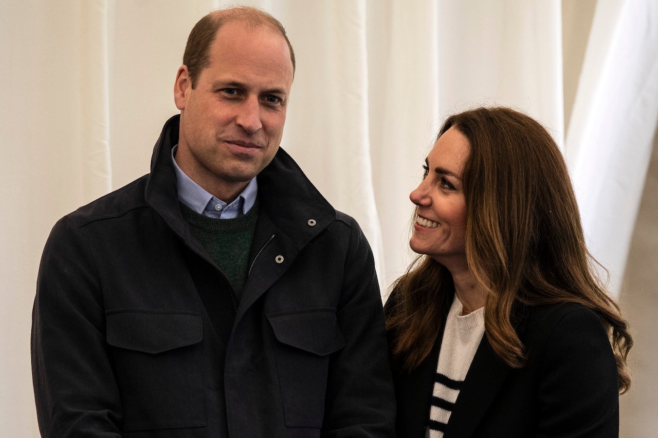 Prince William and Kate Middleton, pictured in Scotland in 2021, form a 'perfect heart shape' according to one body language expert.