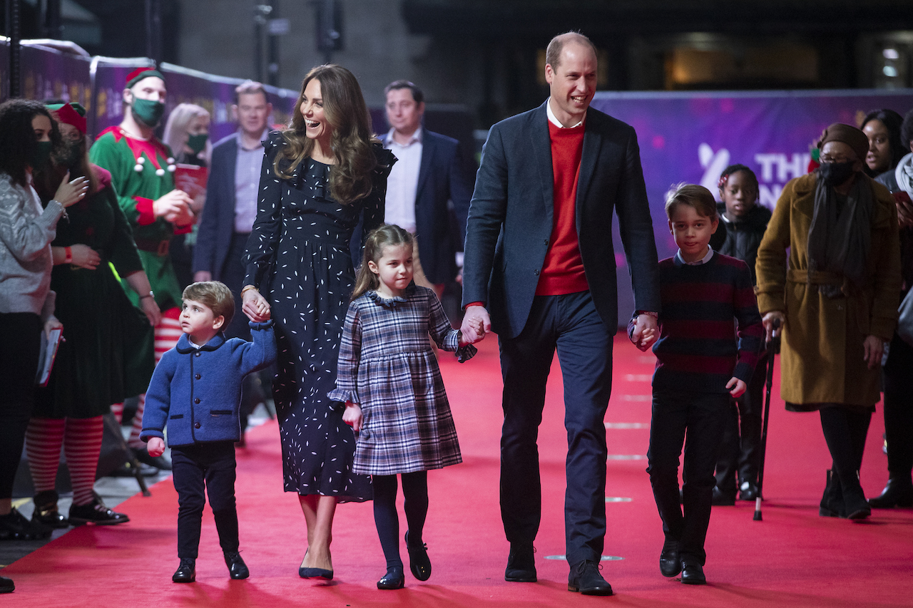 Prince William and Kate Middleton, pictured with their children in 2020, have formed a 'tight cluster' according to a body language expert.