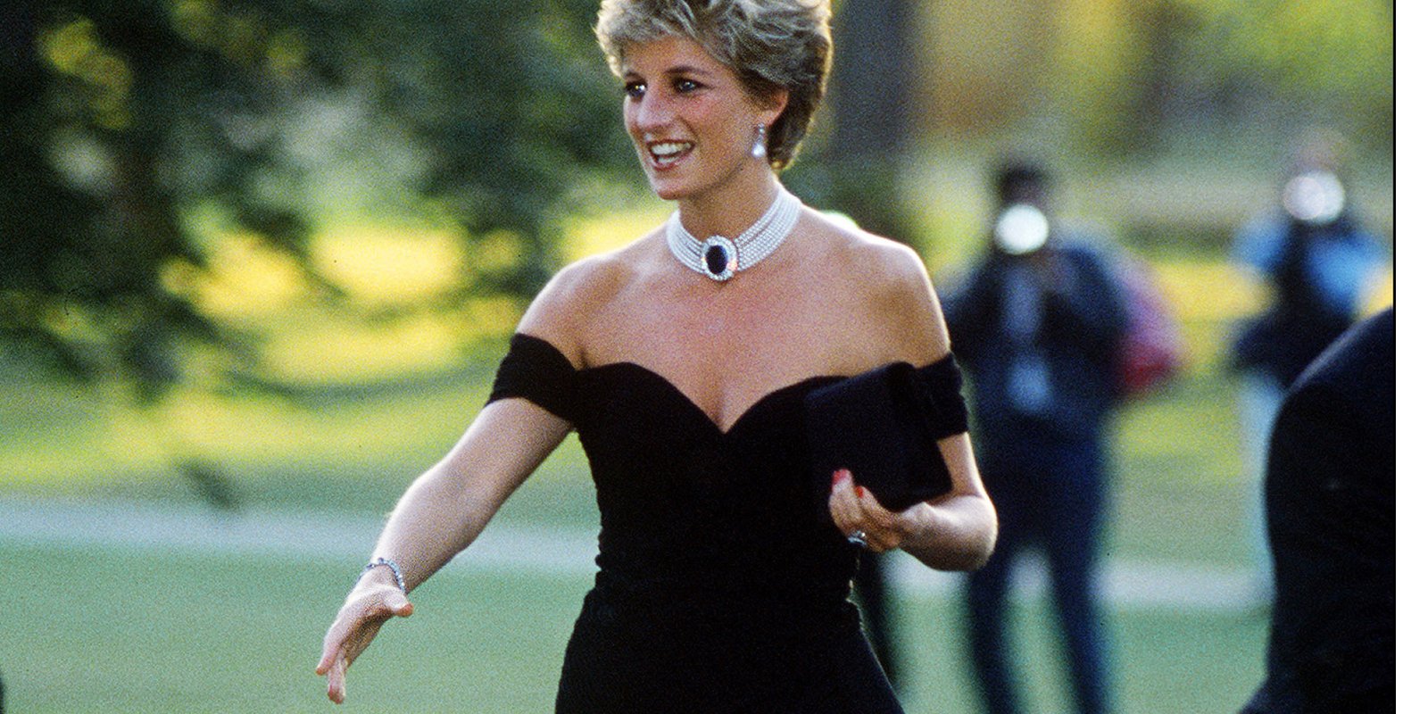 Princess Diana wearing a black strapless gown otherwise known as her "revenge dress."