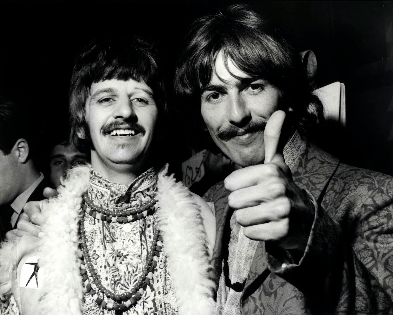 Ringo Starr (left) and George Harrison, who secretly worked on a long-lost song while recording 'Hey Jude,' take a break during a 1967 recording session.