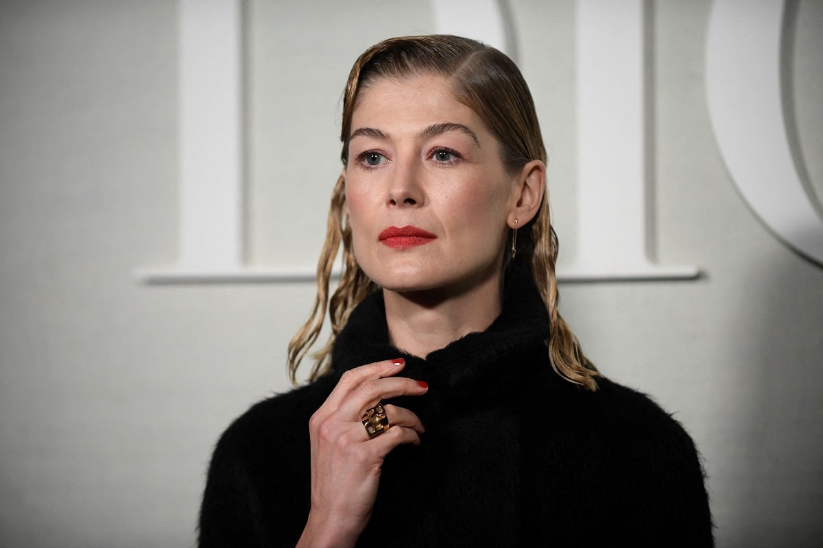 Rosamund Pike attending a fashion show.